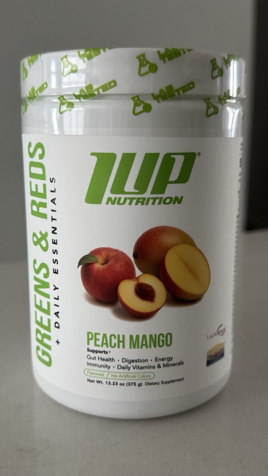 1UP Nutrition Greens & Reds Daily Essentials Peach Mango 06/29